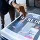 A man takes a copy of the London Evening Standard with the front page reporting the resignation of British Prime Minister David Cameron and the United Kingdom’s vote to leave the European Union with the headline “We’re Out,” and a picture of Cameron holding hands with his wife, Samantha, as they come out of 10 Downing Street in London on June 24, 2016.
LEON NEAL/AFP/Getty Images